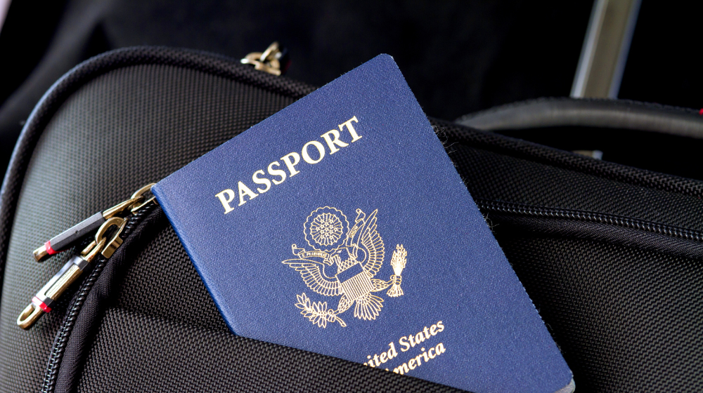 Foreign banknotes, passport, calendar and FedEx parcel