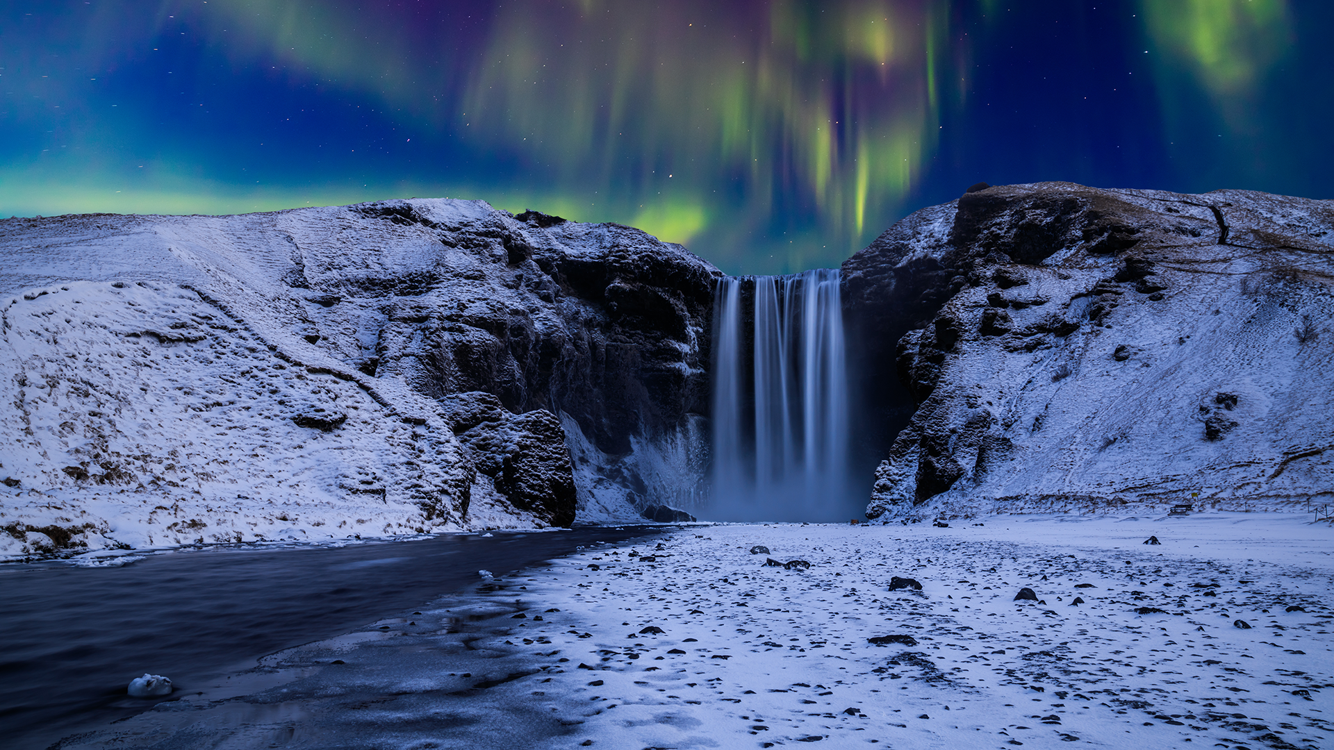 Skogafoss Waterfall Under the Northern Lights, Iceland