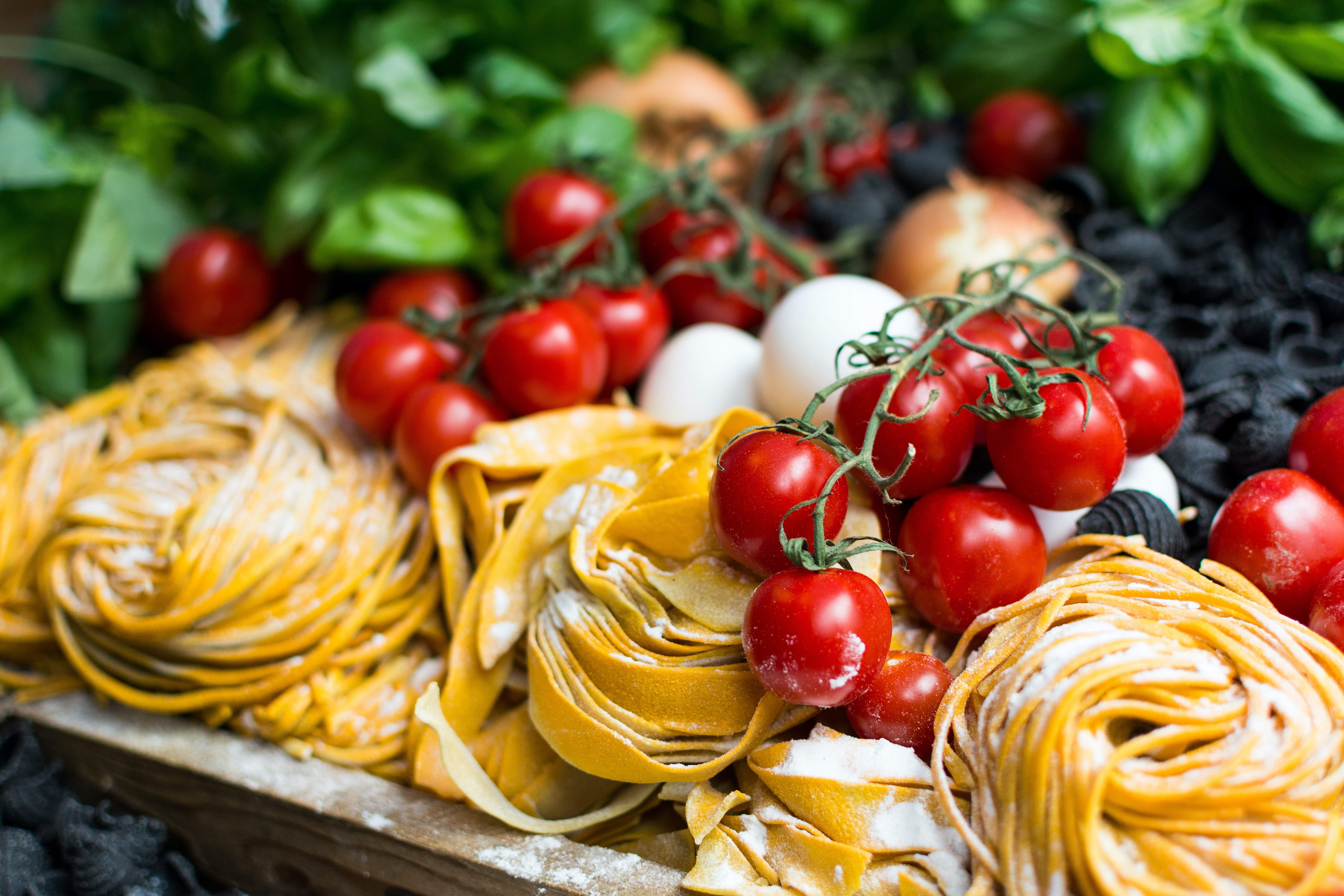 Italian Cuisine: Homemade Pasta, Rich Mozzerella, Fresh Tomatos & Basil