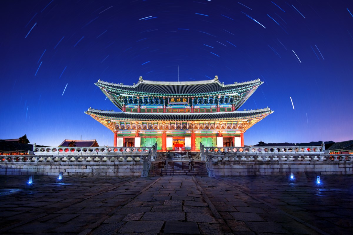 Gyeongbokgung Palace with Star trails at night in Seoul,Korea